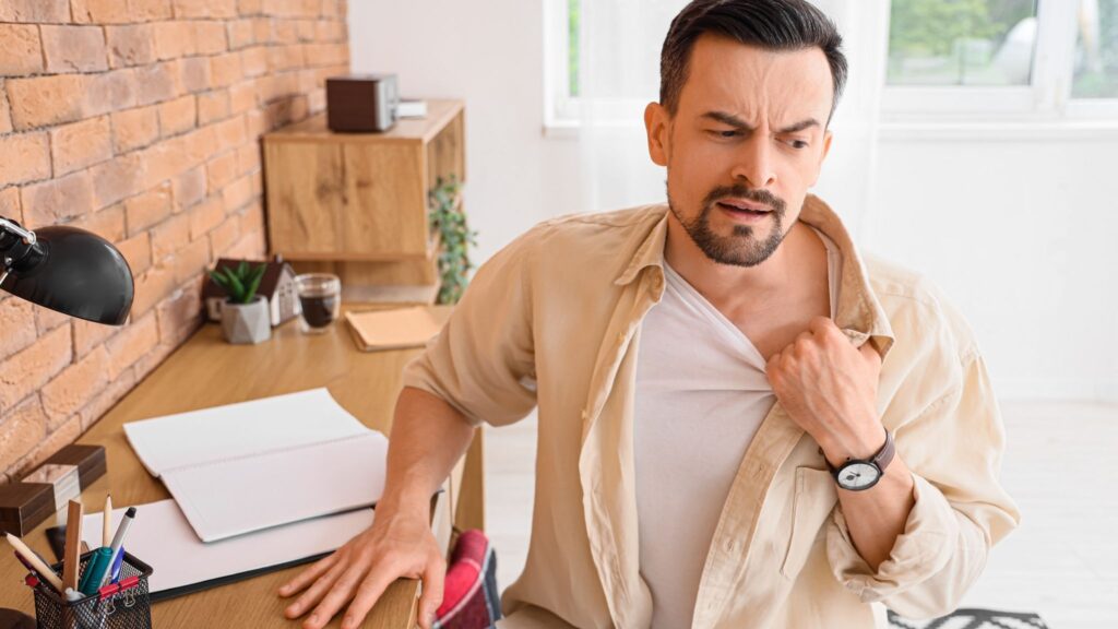 Mann mit Panikattacke - Symptome bei Panikattacken